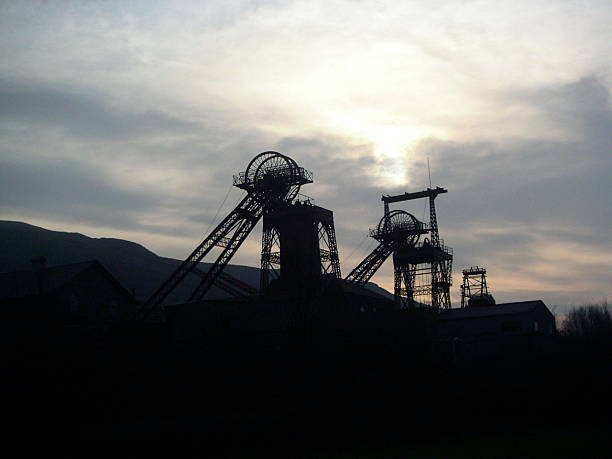 Rhondda Heritage Park This is a sillouette of Rhondda heritage park. A meseam, celebrating, king coal, and the South Wales coal mines. coal mine stock pictures, royalty-free photos & images