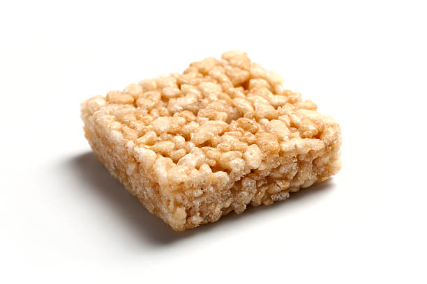 Rice Krispies Squares A picture of rice krispies squares isolated on a white background. crunchy stock pictures, royalty-free photos & images