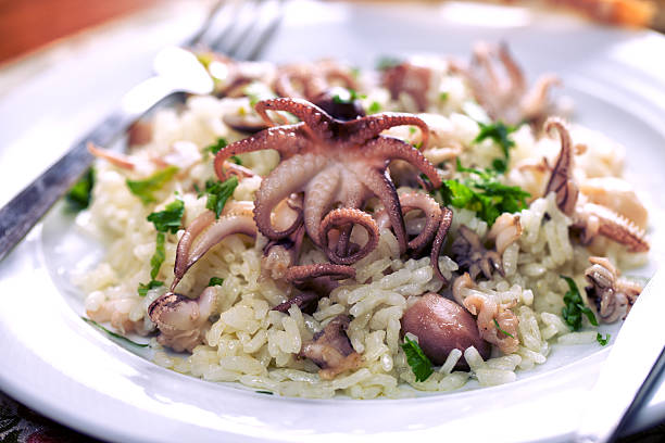 Rice with squid, cuttlefish, octopus stock photo