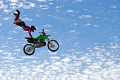 A FMX rider performing a stunt.