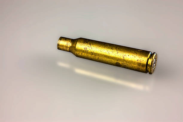 Rifle bullet case stock photo