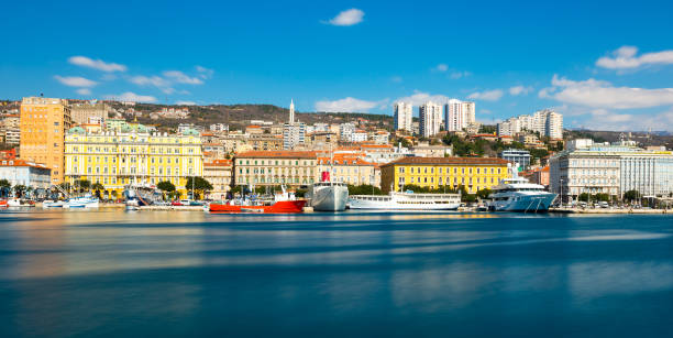 Rijeka, Croatia: Cityscape of Rijeka harbor with historic and modern buildings stock photo