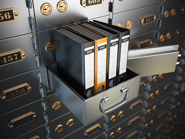 Ring binders on a safe deposit box. Confidential information con Ring binders on a safe deposit box. Confidential information concept. 3d illustration safes and vaults stock pictures, royalty-free photos & images
