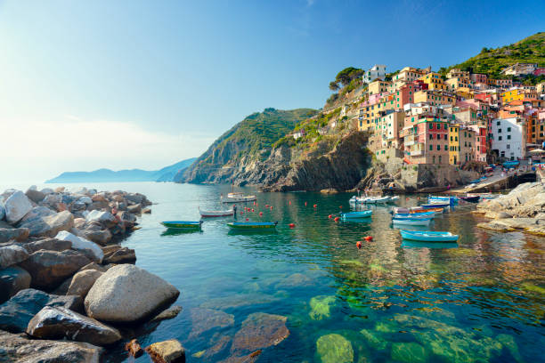 Riomaggiore - Cinque Terre View on Riomaggiore town in Cinque Terre National Park (Liguria, Italy). fishing village stock pictures, royalty-free photos & images