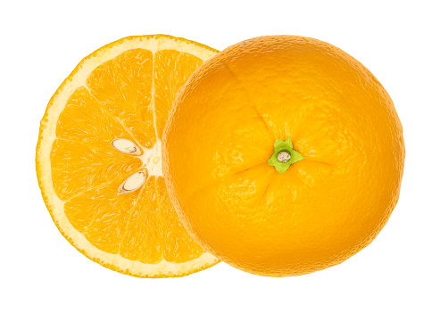 Two orange halves, from above, isolated over white. Ripe fresh orange cut in half, both halves laterally offset, showing peduncle, cross section with segments, fruit flesh and seeds. Macro food photo.
