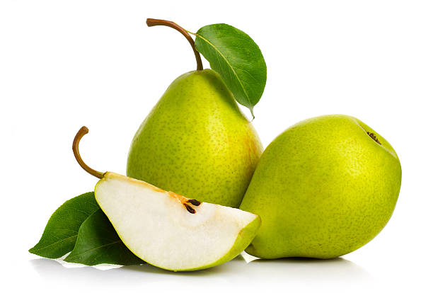 Ripe green pears isolated with leaves isolated Ripe green pears isolated with leaves isolated on white pear stock pictures, royalty-free photos & images