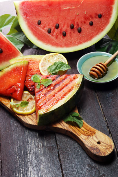 Ripe Healthy Organic Grilled Watermelon with Honey. stock photo