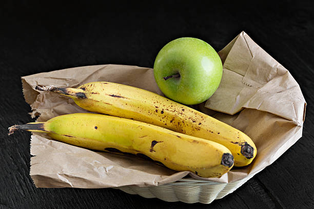 Ripening Bananas  bananas apple brown stock pictures, royalty-free photos & images