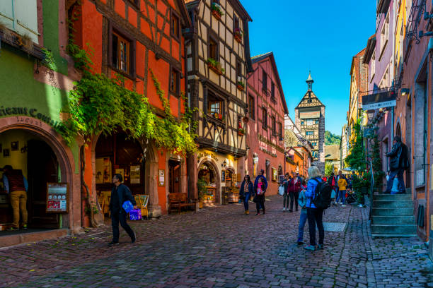 Riquewihr in France Riquewihr, France - October 26, 2019: Riquewihr is a very famous town with many half-timbered houses and streets with cobblestones in Alsace in France. riquewihr stock pictures, royalty-free photos & images