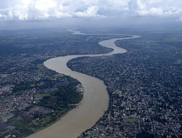 River Ganga at Kolkata The holiest river of India, the river Ganga passes through the city of Kolkata before emptying into Bay of Bengal around 120km away. ganges river stock pictures, royalty-free photos & images