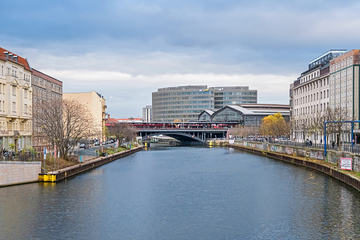 River Spree with the railway station Friedrichstrasse and an area Spreedreieck in Berlin, Germany