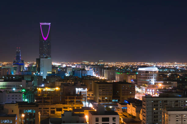 Riyadh Skyline at Night #11, with Kingdom Tower Lit in Purple, Saudi Arabia Riyadh Skyline at Night #11, with Kingdom Tower Lit in Purple, Saudi Arabia riyadh stock pictures, royalty-free photos & images