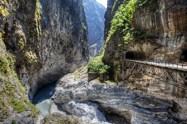 Road, bridge and tunnel crossing Taroko National Park, Taiwan gorges stock photo