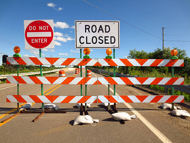 Road Closed Road barricaded because of construction.   dead end road stock pictures, royalty-free photos & images