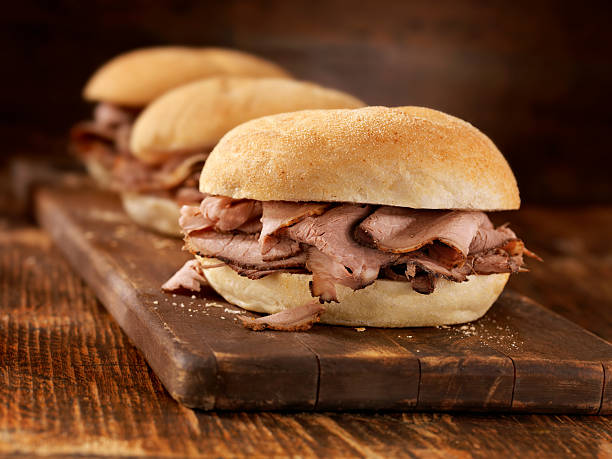 Roast Beef Sandwiches Roast Beef Sandwiches - Photographed on Hasselblad H3D2-39mb Camera roast beef sandwich stock pictures, royalty-free photos & images