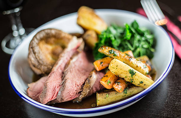 Roast Beef - Sunday Dinner Traditional British Cuisine - Sunday Dinner, Restaurant Style roast dinner stock pictures, royalty-free photos & images