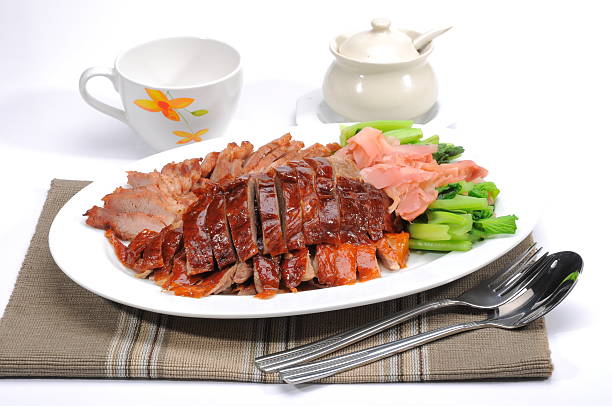 Roast Duck and Barbecued Pork on plate stock photo