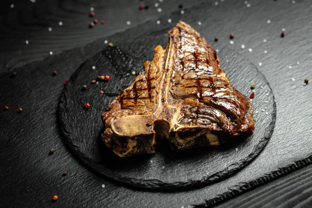 roast tbone or porterhouse beef meat steak for steakhouse menu black picture - The Tasty Hub