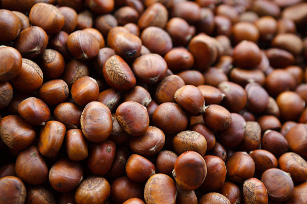 Roasted chestnuts close up. Background. Roasted chestnuts close up. Background. chestnut food stock pictures, royalty-free photos & images