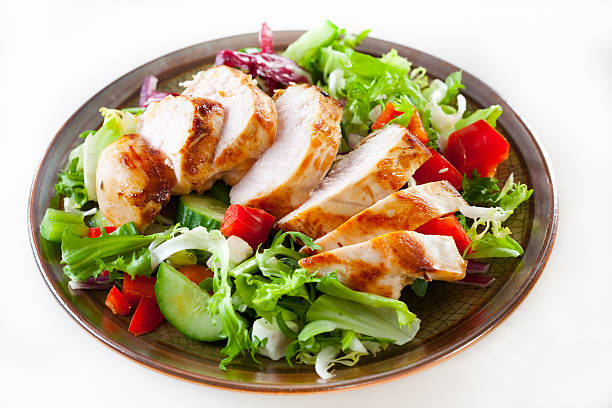 Roasted chicken breast Roasted chicken fillet with lettuce chicken salad stock pictures, royalty-free photos & images