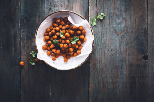 Roasted chickpeas with spices Cumin and Paprika for aperitif stock photo