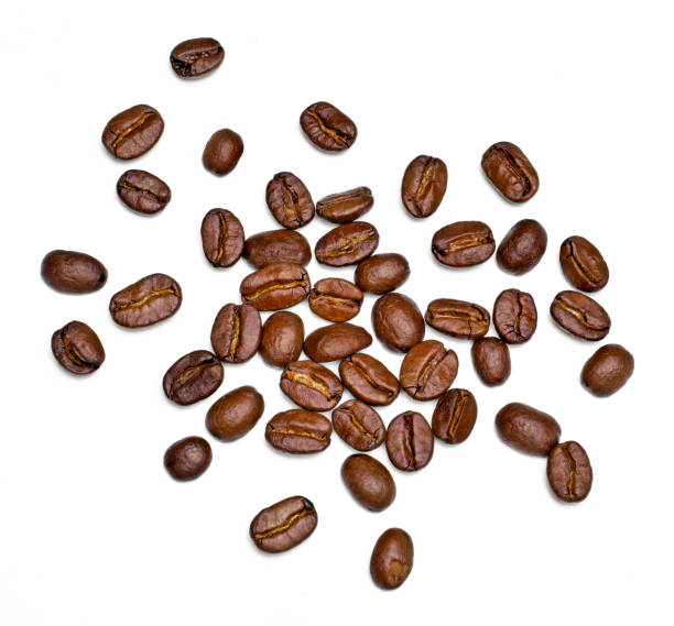 Roasted coffee beans, isolated on white stock photo