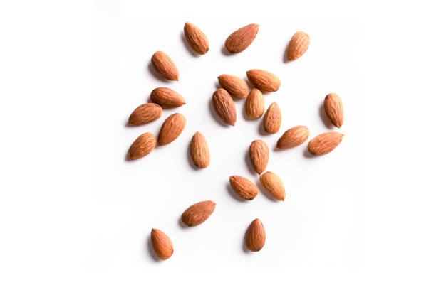 Roasted peeled almond nuts texture ,top view. Almond nuts background. Best healthy food almond concept Roasted peeled almond nuts texture ,top view. Almond nuts background. Best healthy food almond concept almond stock pictures, royalty-free photos & images