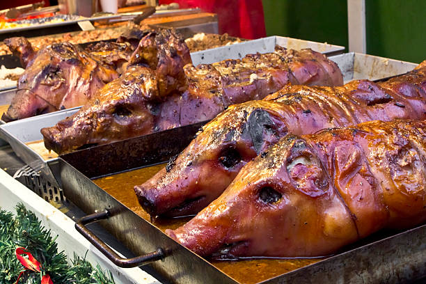 Best Roasted Whole Pig Stock Photos, Pictures & Royalty-Free Images