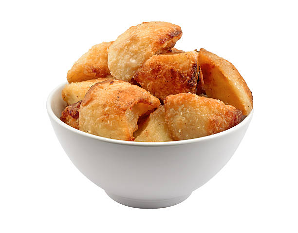 Roasties in a bowl isolated stock photo