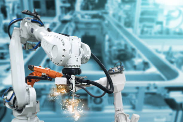 Robotic arms, industrial robots, factory automation machines stock photo