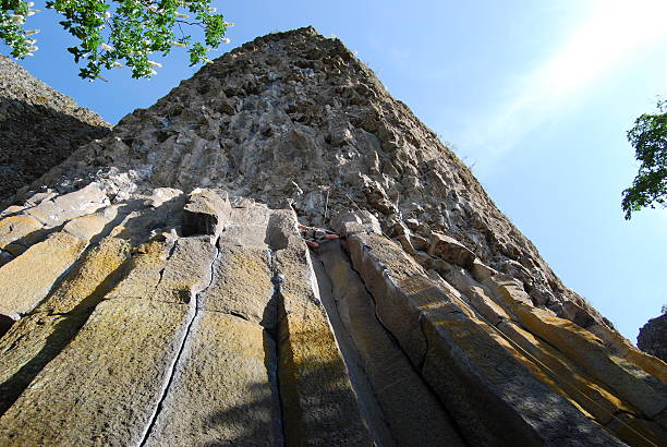 Rock Climber Way High Up! stock photo