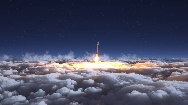 Rocket flies through the clouds on moonlight stock photo