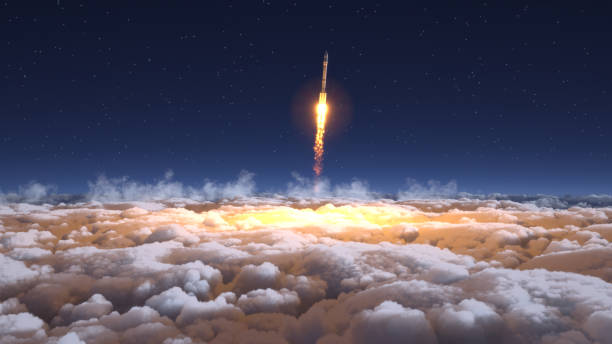 Rocket flies through the clouds on moonlight stock photo