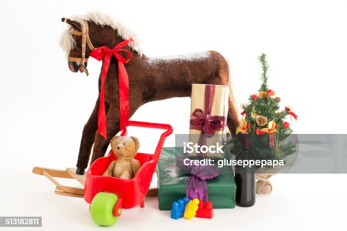 istock rocking horse and gift 513182811