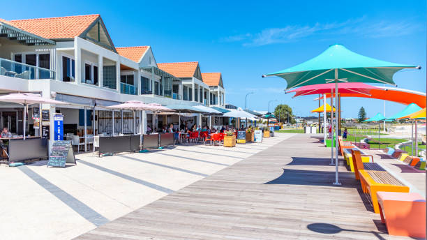 Rockingham foreshore makeover with colourful umbrellas and seats. stock photo