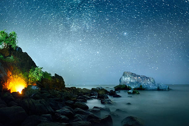 Rocky coast at night stock photo