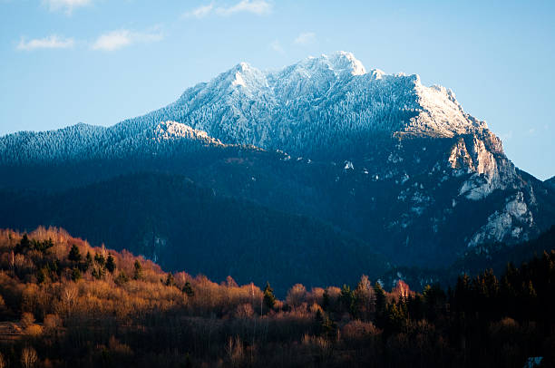 rocky mountain in autumn evening stock photo