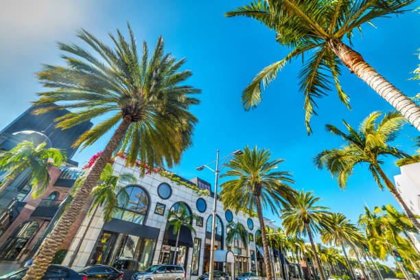 Rodeo Drive under a shining sun Rodeo Drive under a shining sun, Beverly Hills. California, USA international landmark stock pictures, royalty-free photos & images