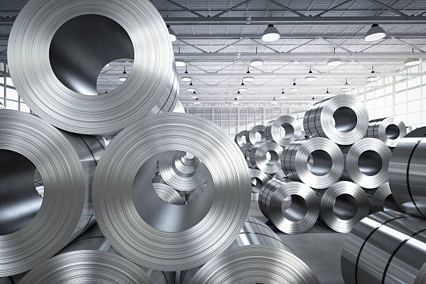 roll of steel sheet in factory - staal stockfoto's en -beelden