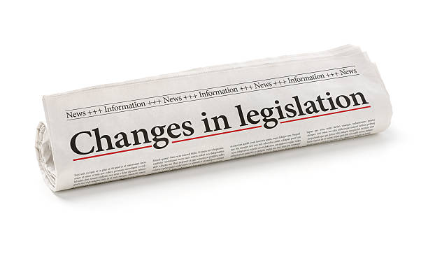 Rolled newspaper with the headline Changes in legislation Rolled newspaper with the headline Changes in legislation legislation stock pictures, royalty-free photos & images