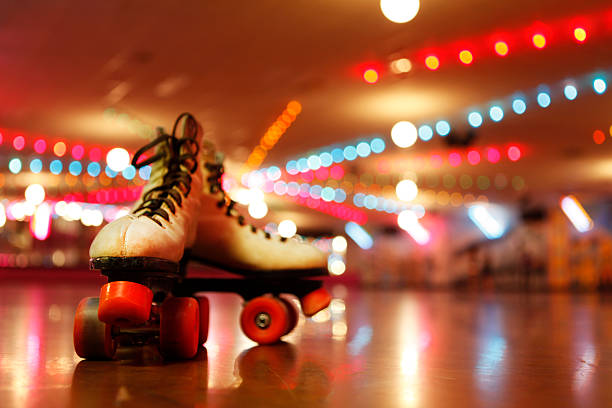 Rollerskates in the Roller Disco Roller skates under the lights of the roller disco disco dancing stock pictures, royalty-free photos & images