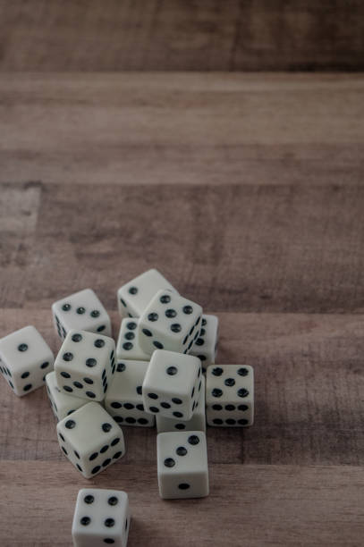 Rolling dice stock photo