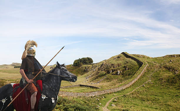 Roman Soldier guarding Hadrians Wall  roman stock pictures, royalty-free photos & images