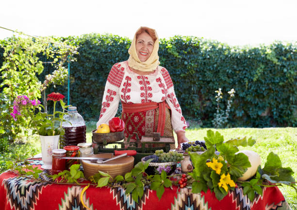 Romanian Peasant Woman Selling Agricultural Products stock photo