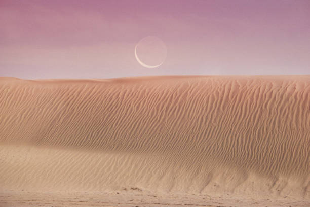Romantic Sandwave and crescent  moon stock photo