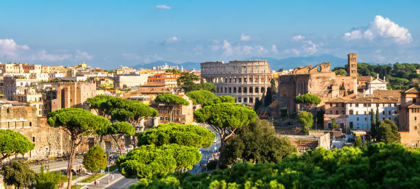 Rome Skyline with Colosseum and Roman Forum, Italy Rome, Italy city skyline with landmarks of the Ancient Rome ; Colosseum and Roman Forum, the famous travel destination of Italy. ancient rome stock pictures, royalty-free photos & images
