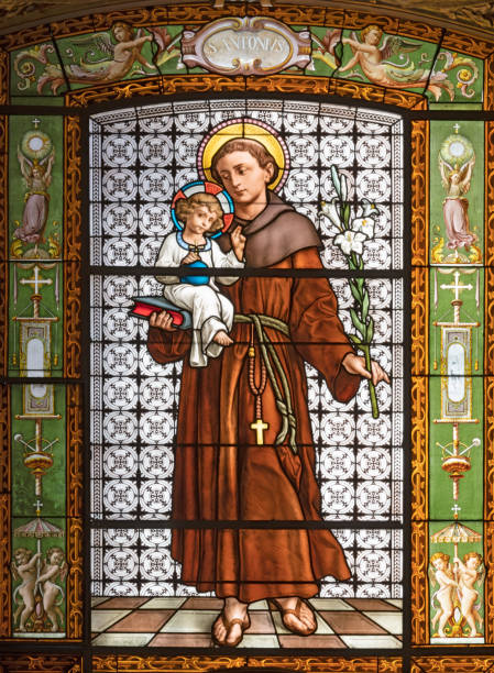 Rome - The St. Anthony of Padua in the stained glass in the church Sant'Antonio dei Portoghesi. stock photo