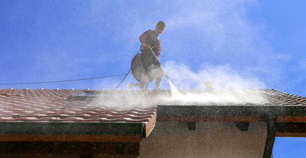 Roof cleaning with high pressure stock photo