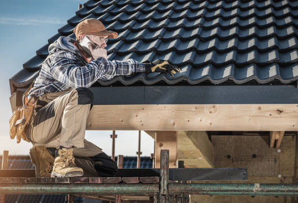 Roof Construction Worker Making Phone Call While Staying on Scaffolding. stock photo