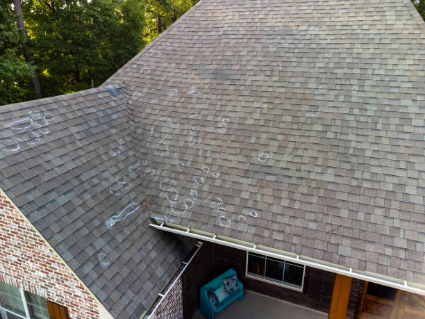 Roof with hail damage and markings from inspection stock photo